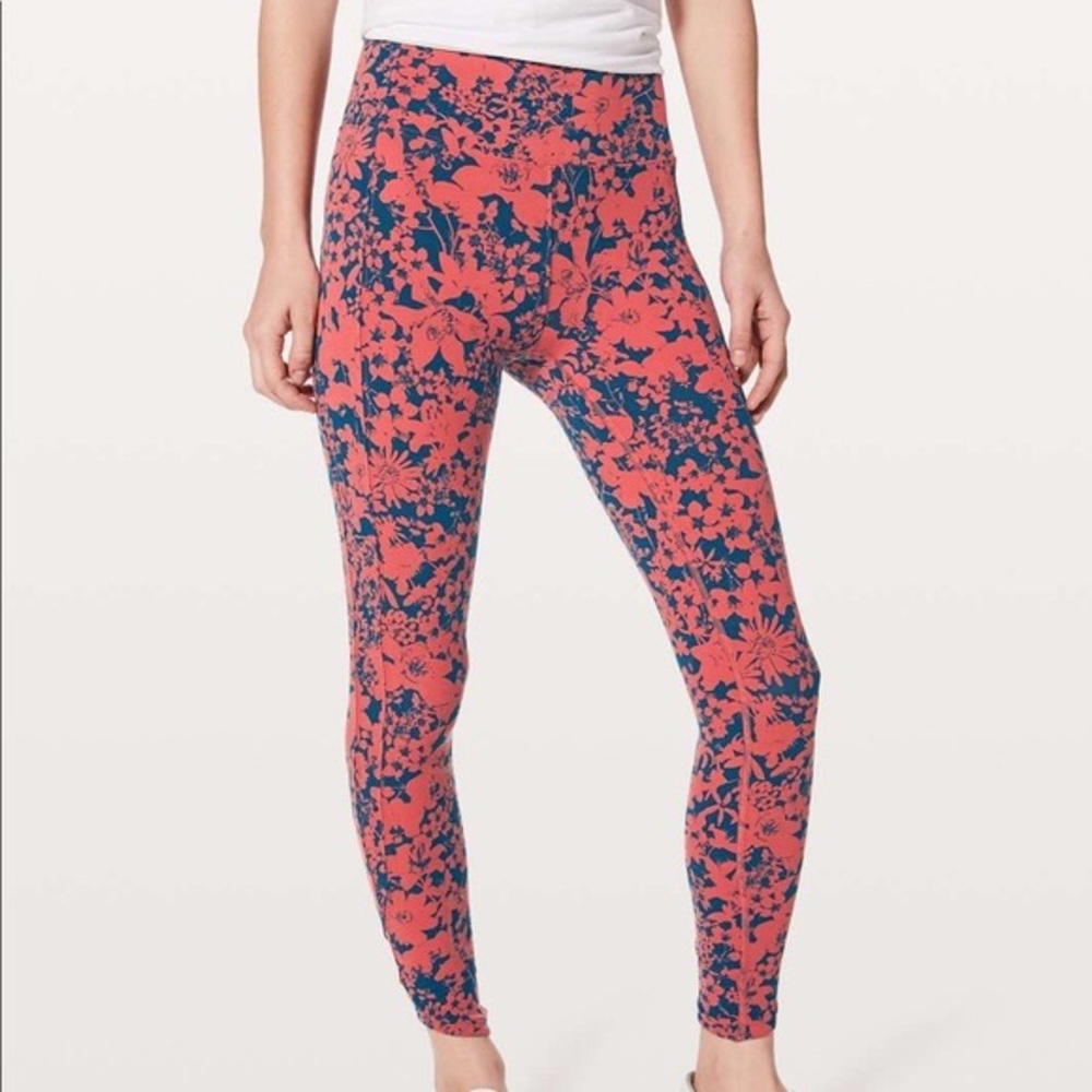 Coral Blue Floral Final Lap Activewear Bottoms
Size: 4 (S)